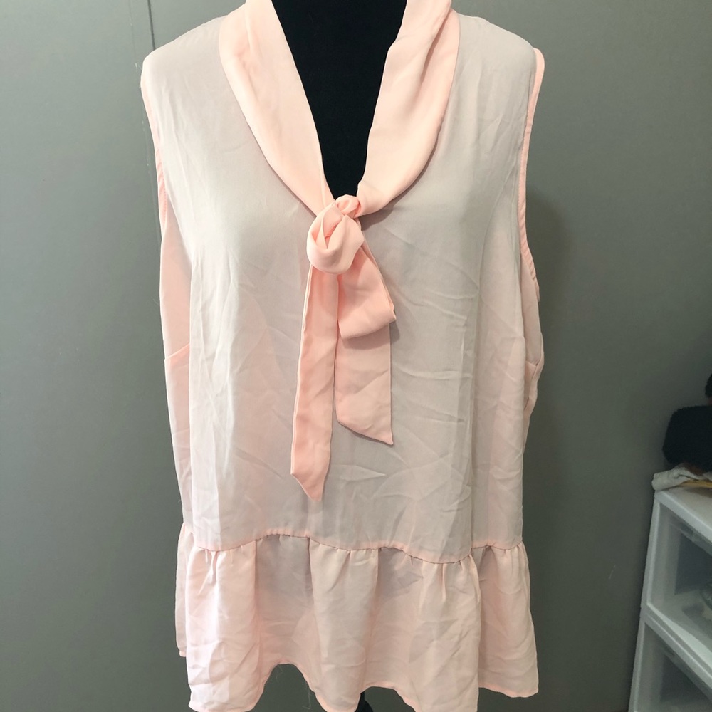Light pink sheer tank top with ruffle detailing